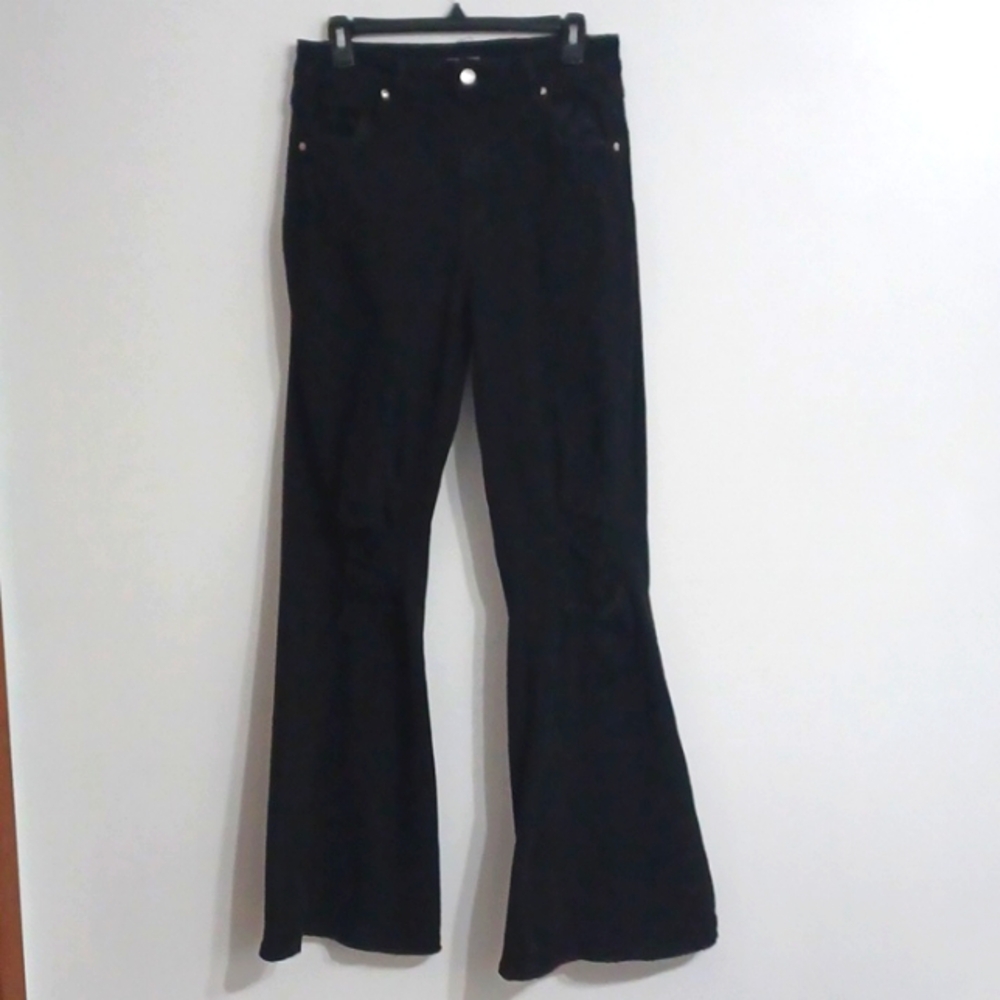 Size 7 black jeans. Long distressed faded denim flared bell bottom pants. 70s